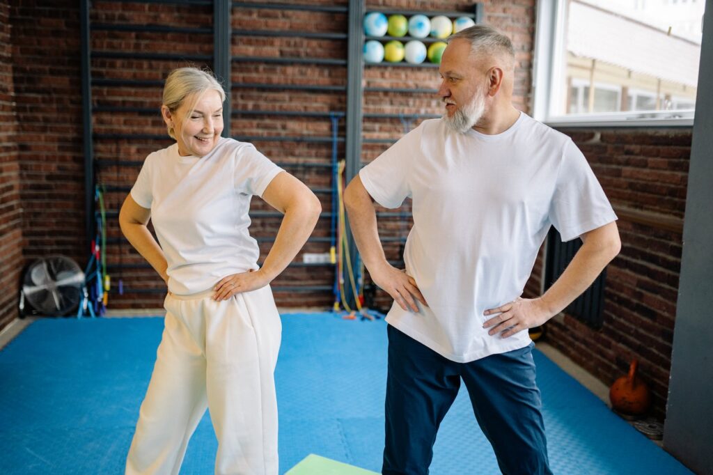 an elderly couple swaying their hips